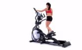 Workout in winter with elliptical machine